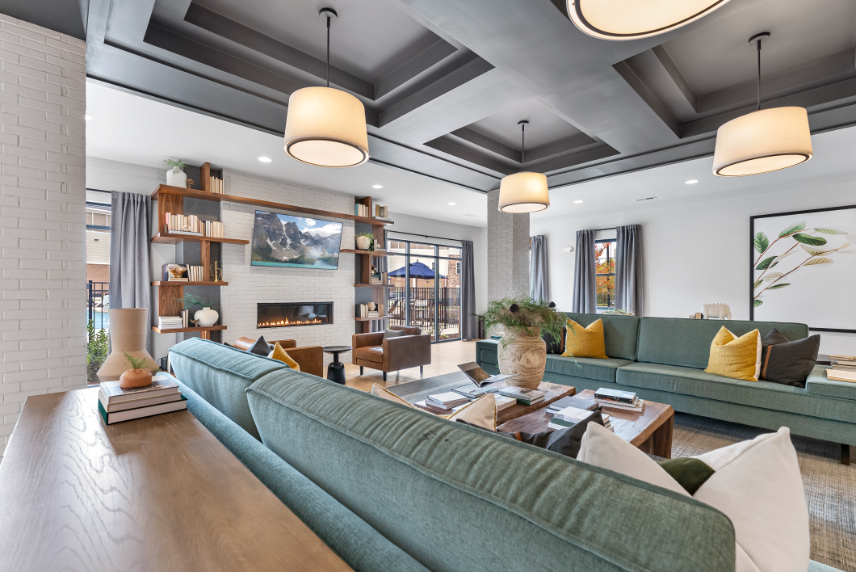 a living room with couches and a fireplace
