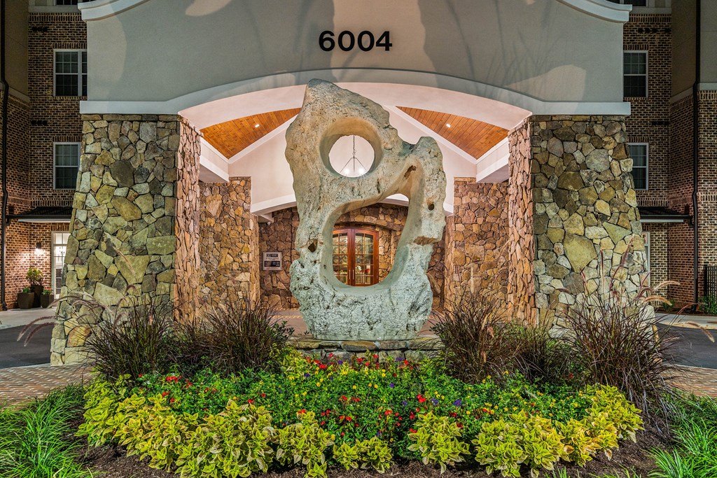 the facade of a building with a large stone sculpture of a mouth