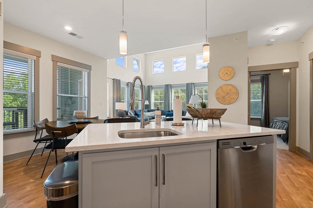 a kitchen with a sink and a counter top
