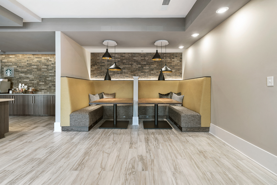 Booth-style co-working space cubby at Hawthorne at Friendly apartments