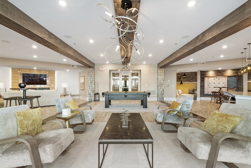 a large living room with couches and a coffee table