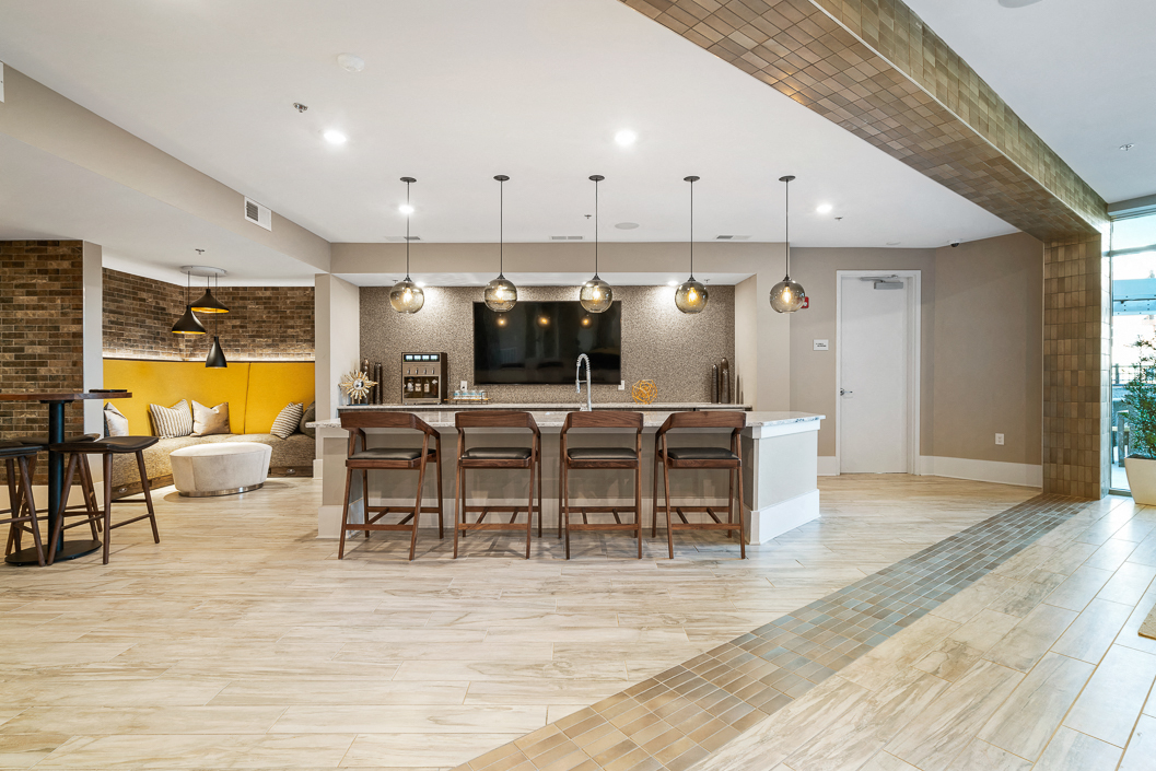 Resident Lounge with demo kitchen Hawthorne at Friendly