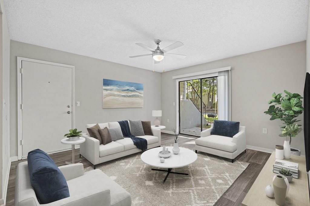 a living room with couches and a coffee table