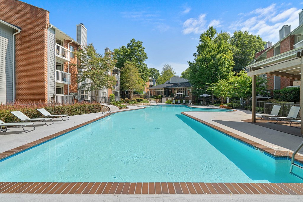 the swimming pool at the preserve at polo towers apartments