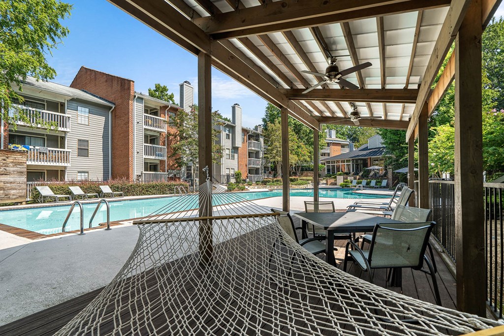 our apartments have a large pool and a hammock on our patio