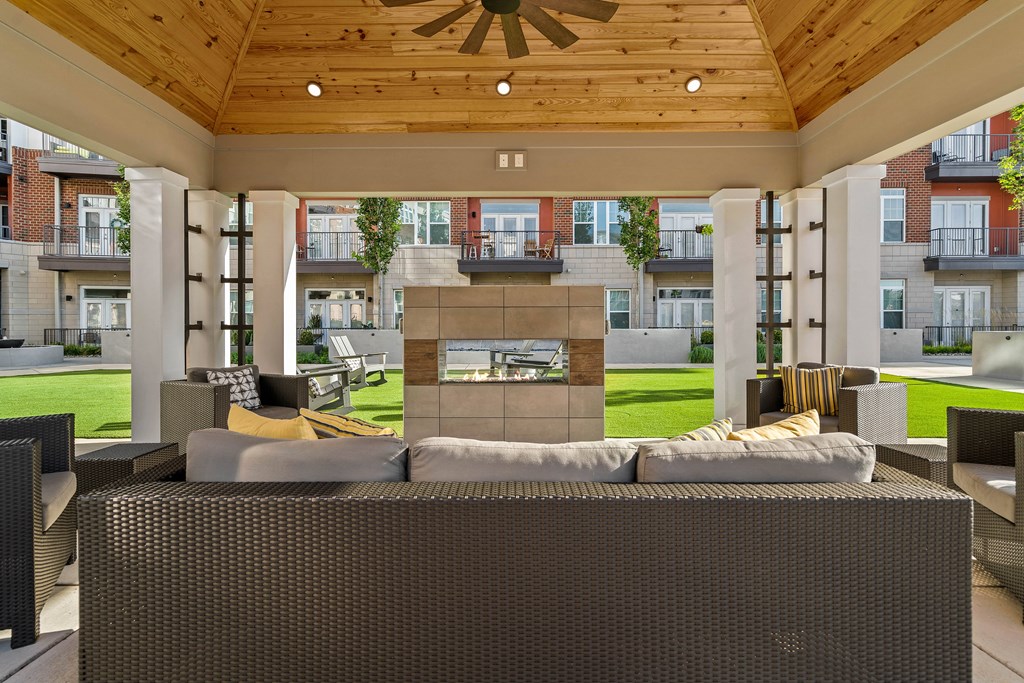 a living room with a couch and a fireplace