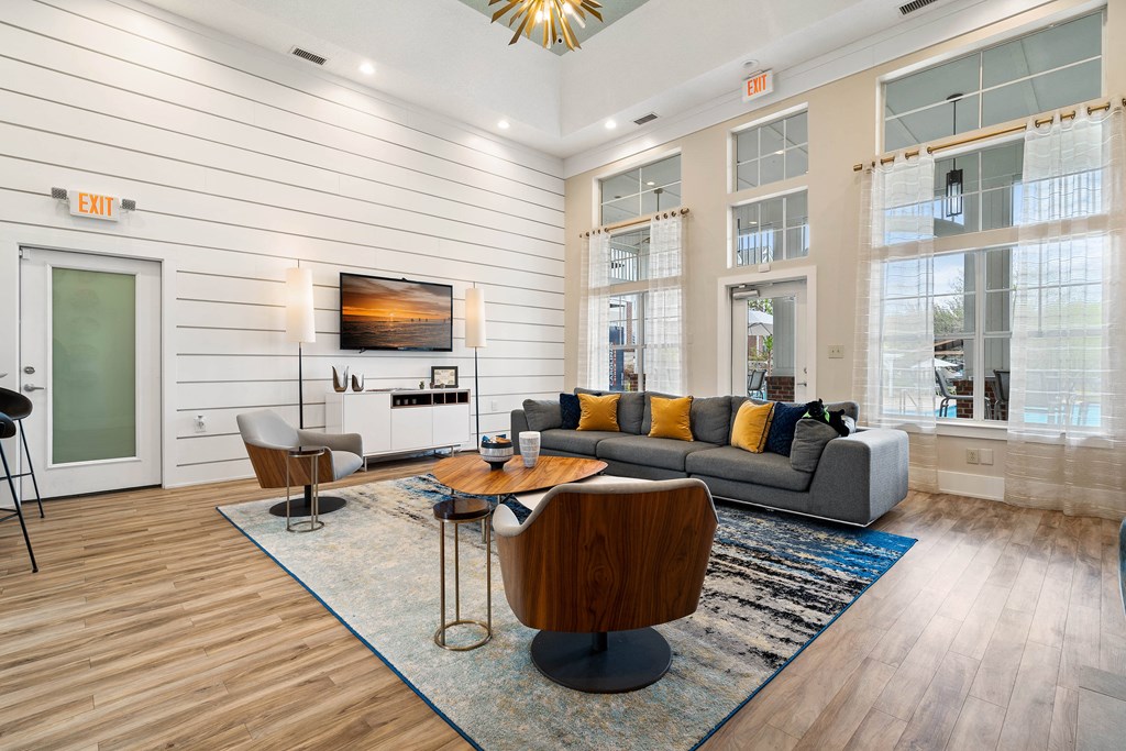 a living room with a couch and a table