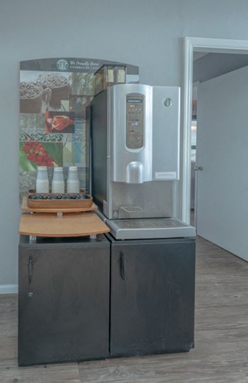 Complimentary Starbucks coffee machine at Hawthorne Westside's clubhouse