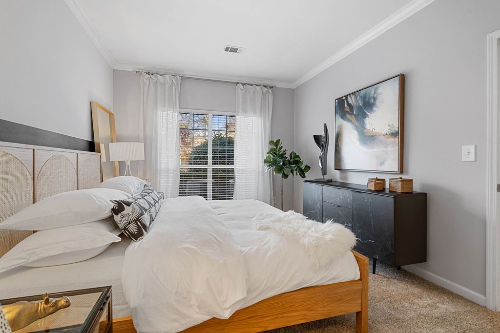 Beautiful bedroom at Hawthorne at the Carlyle in Greenville, SC