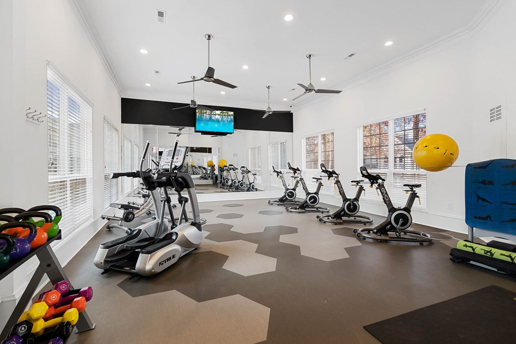 Elite fitness center with weights and cardio equipment at Hawthorne at the Carlyle in Greenville, SC