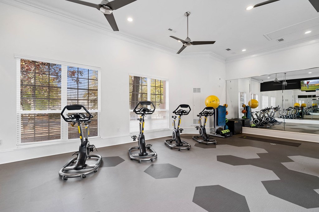 Elite fitness center with weights and cardio equipment at Hawthorne at the Carlyle in Greenville, SC