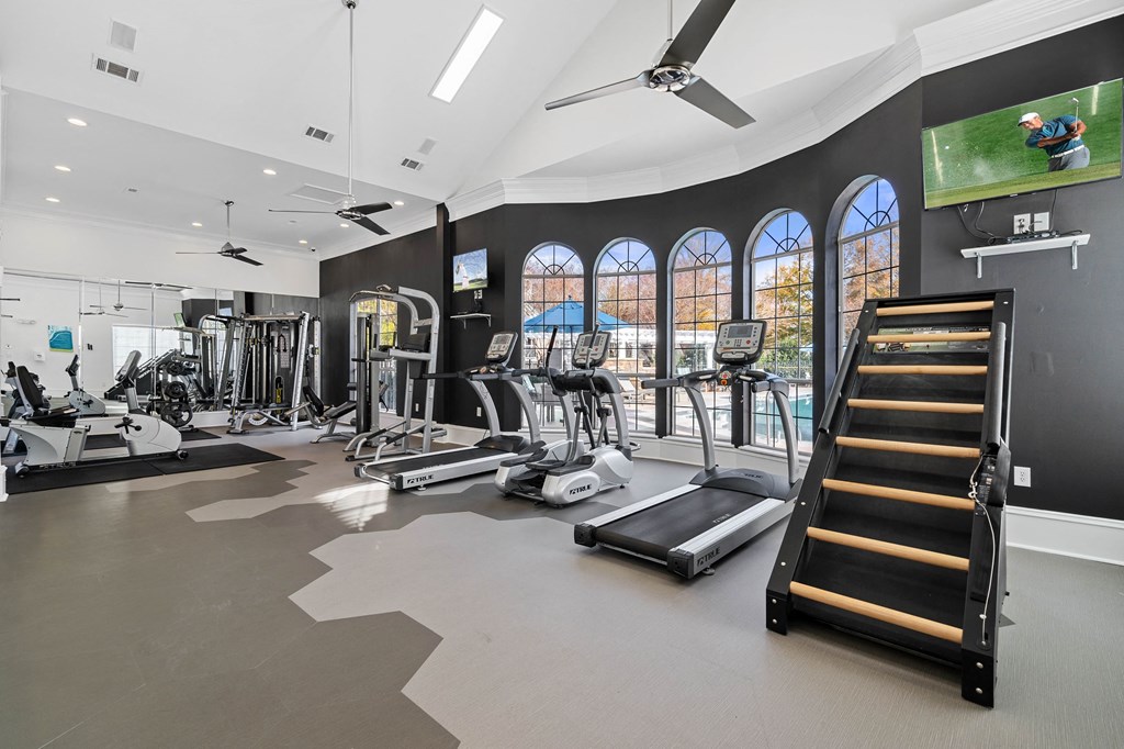 Elite fitness center with weights and cardio equipment at Hawthorne at the Carlyle in Greenville, SC