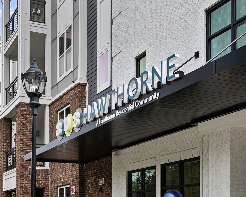 a sign on the side of a building with a