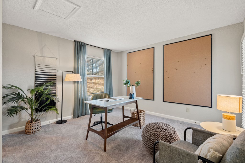 the preserve at ballantyne commons living room with windows and a table