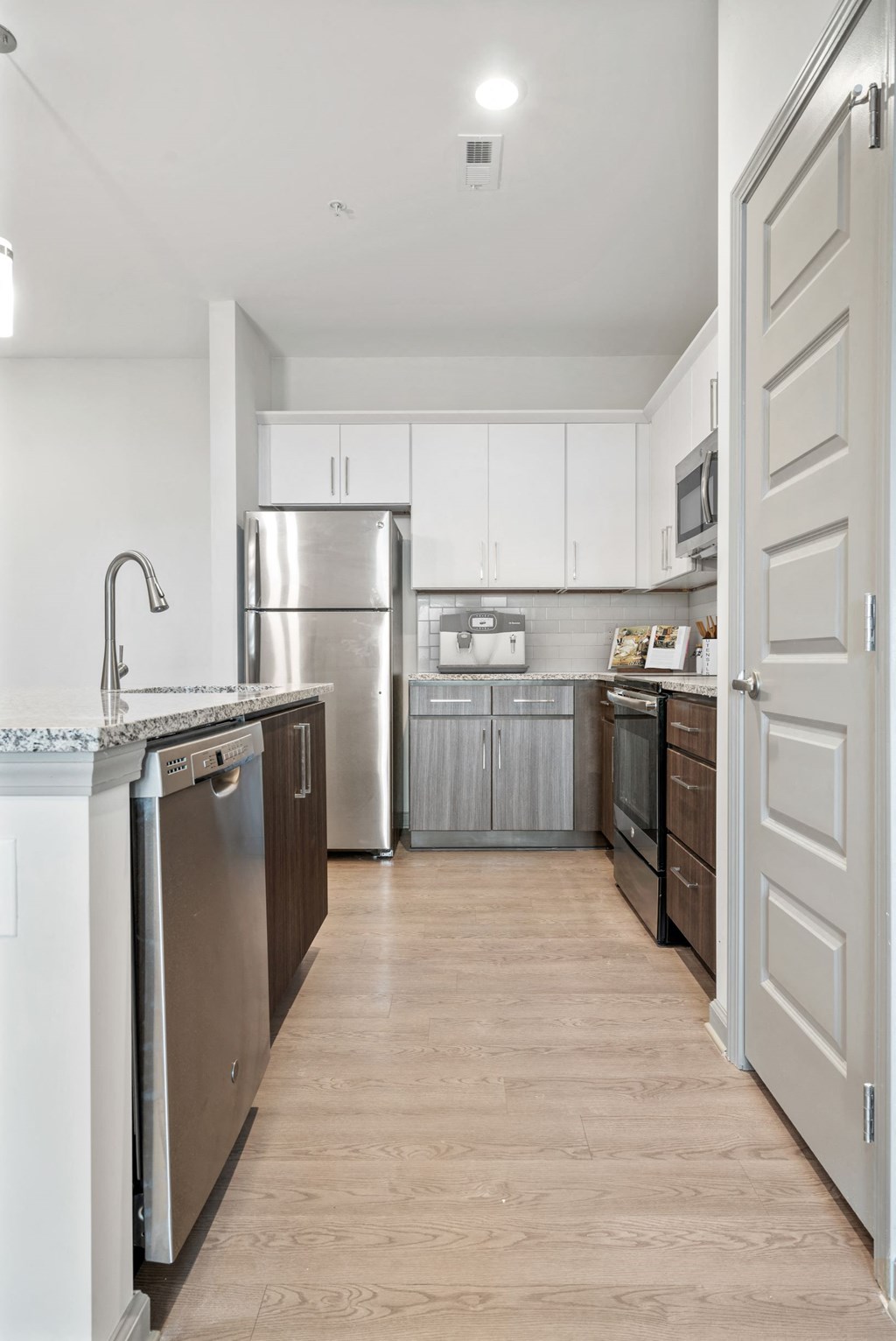 Two color custom cabinetry in your kitchen at Hawthorne at the Glen in Concord, NC