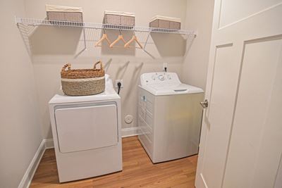 Full-sized washer and dryer in your home at Hawthorne at Pine Forest in Oak Island, NC