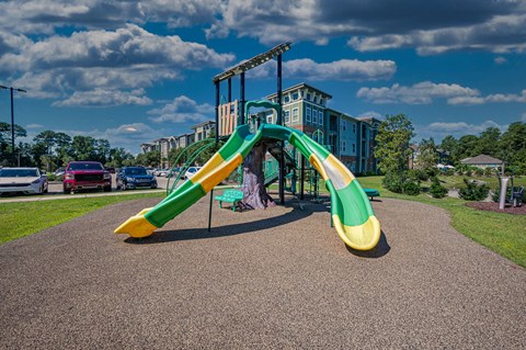 a slide on a playground in a park