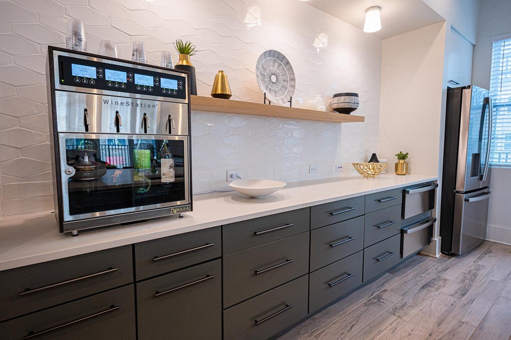an image of a kitchen with a wine refrigerator