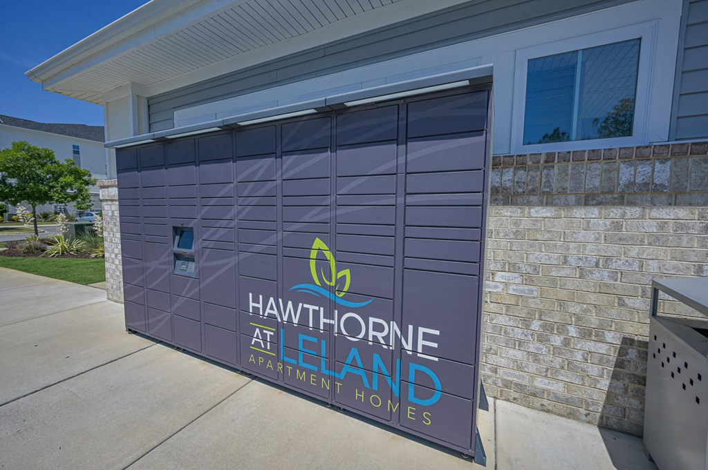 a lavender garage door in front of a building with the hawthorne at