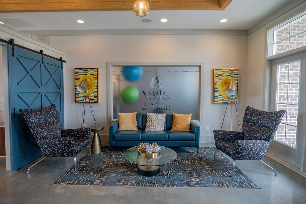 Relax with friends and family inside the clubhouse at Millis and Main at Grandover