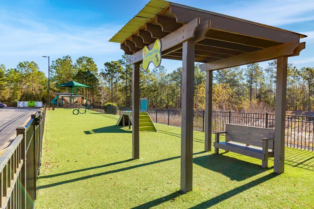 the park has a playground and a bench