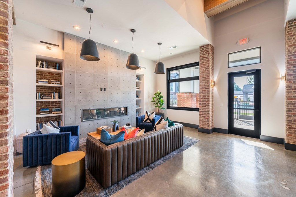 a living room with couches and a fireplace