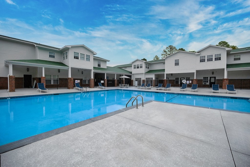 our apartments have a large swimming pool with lounge chairs