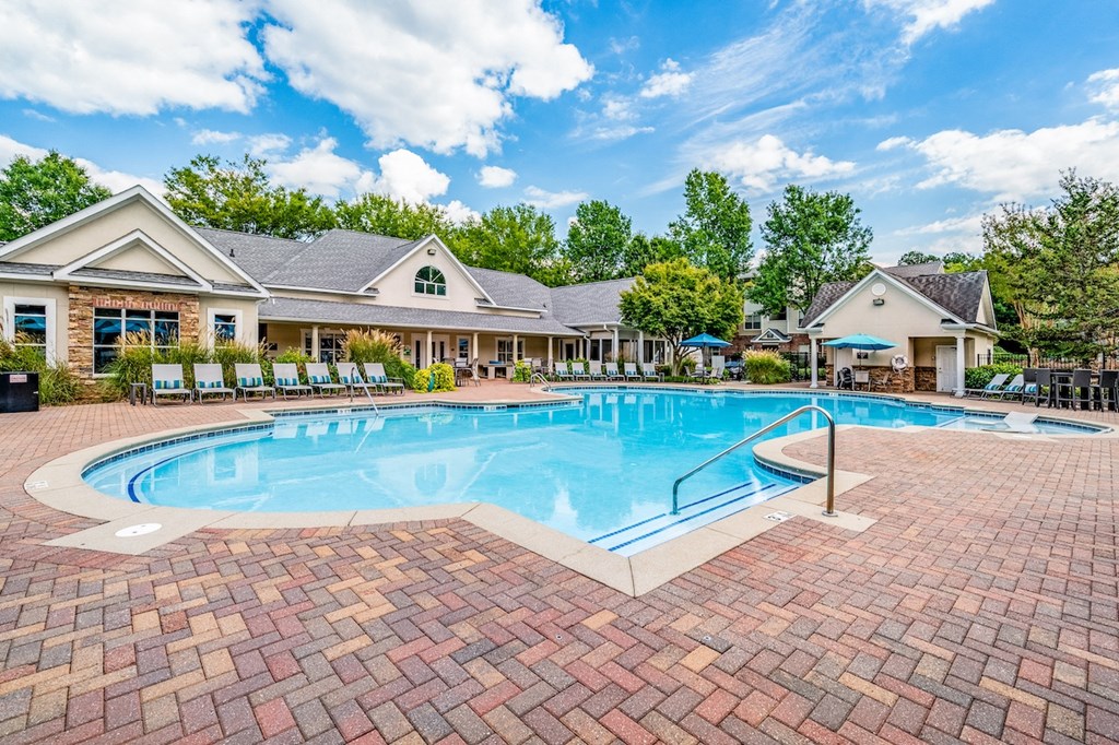 Amenities Resort-style saltwater swimming pool with in-pool lounge chairs at Hawthorne at Kennesaw in Kennesaw, GA