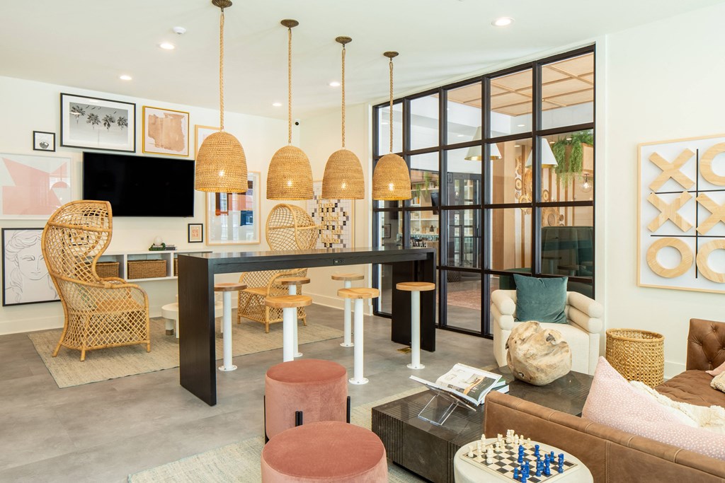 Spacious Game Room with a Pool Table and Lounge-Style Seating