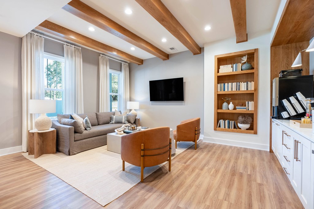 a living room with a couch and a tv