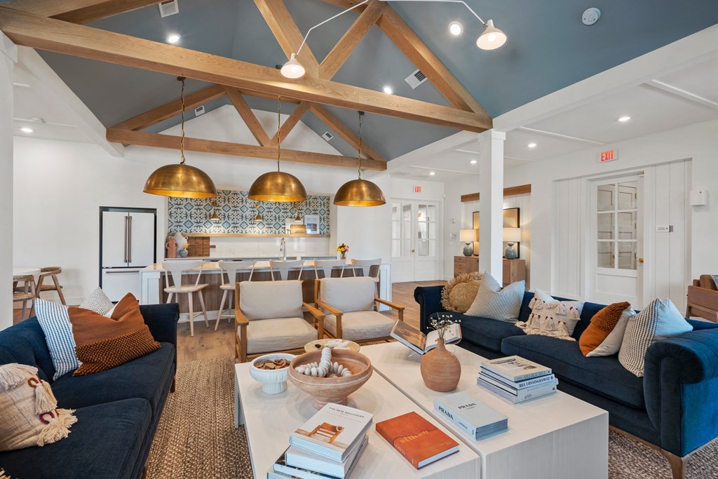 a living room with couches and a coffee table