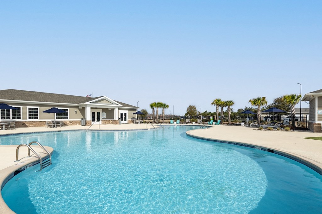 Amenities Highlight Saltwater Swimming Pool With Expansive Sundeck