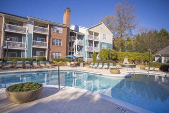 Tennis court and pool views from your home at Hawthorne at the Park
