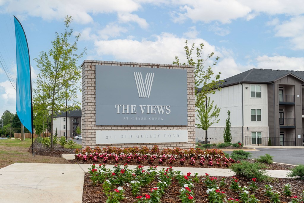 the views at city center sign in front of apartments