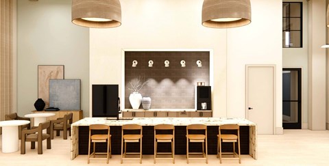 A dining room with a long table and chairs.