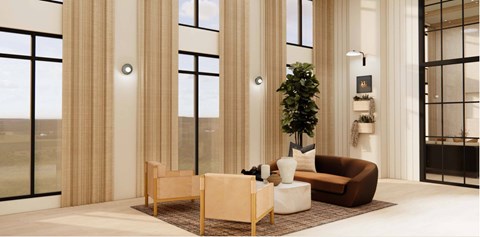 A living room with a brown couch, a white chair, and a brown ottoman.
