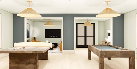 A room with a pool table and a billiard table.