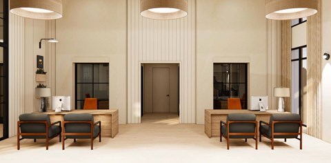 A large room with a desk and chairs in it.