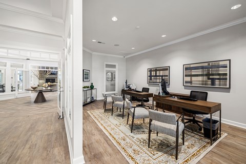 Clubhouse Business Center Area with Chairs , Desks and Computers.