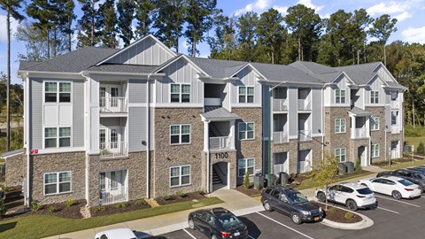 Residential Complex with a Parking Lot in Front.