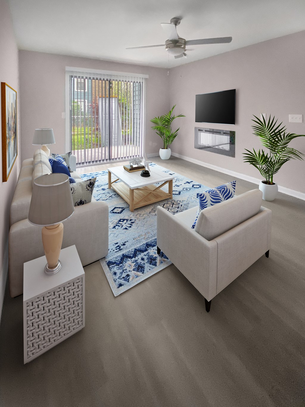 a living room with couches and a coffee table and a television