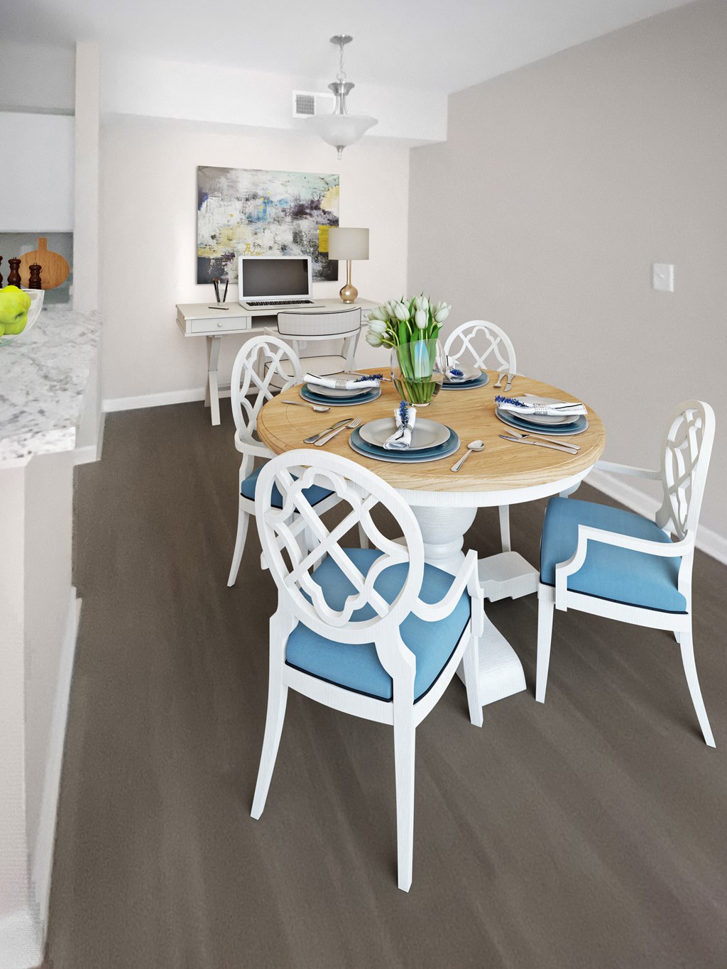 a dining room with a table and chairs