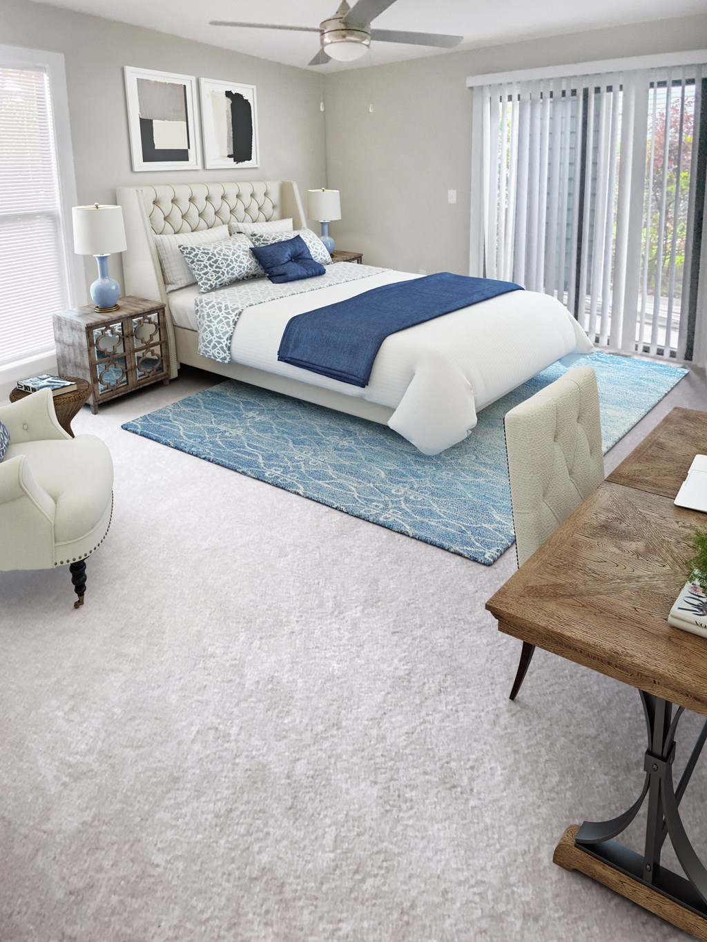 a bedroom with a large bed and a blue rug