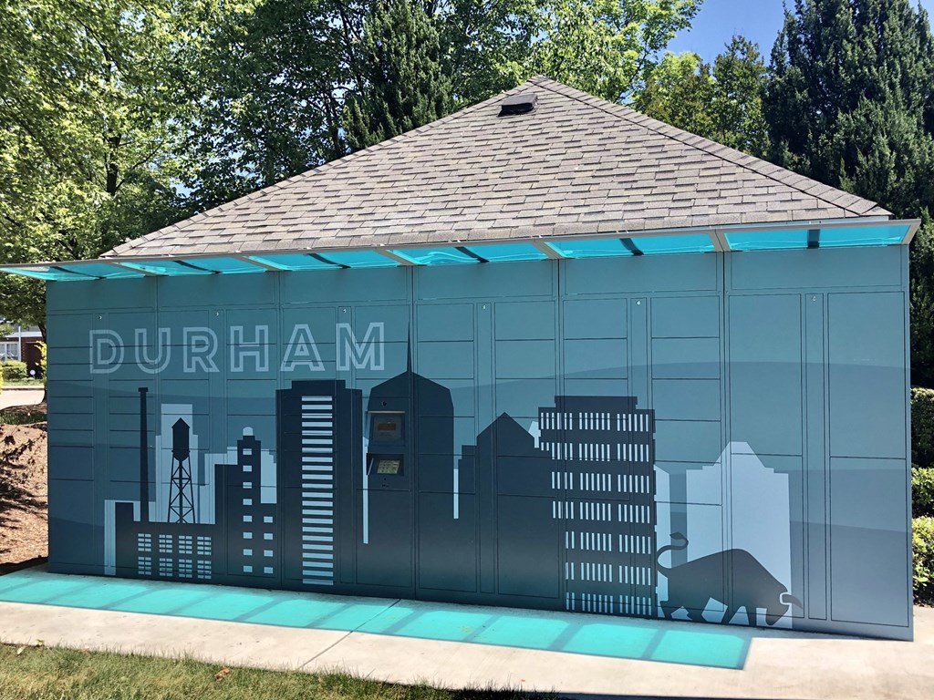 a building with a city skyline painted on the side of it