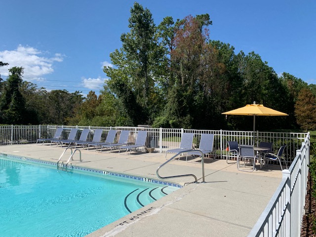 Sparkling swimming pool at Deerbrook Apartments in Wilmington, NC 28405