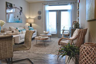 Coastal inspired decor in apartment living room Hawthorne at Smith Creek