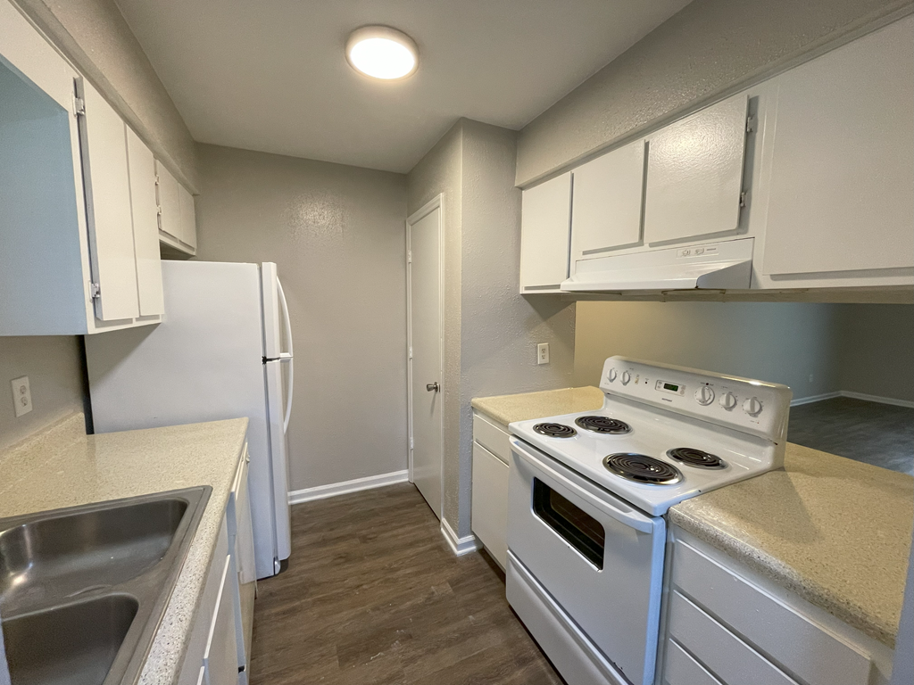 classic kitchen with white appliannces and light counters