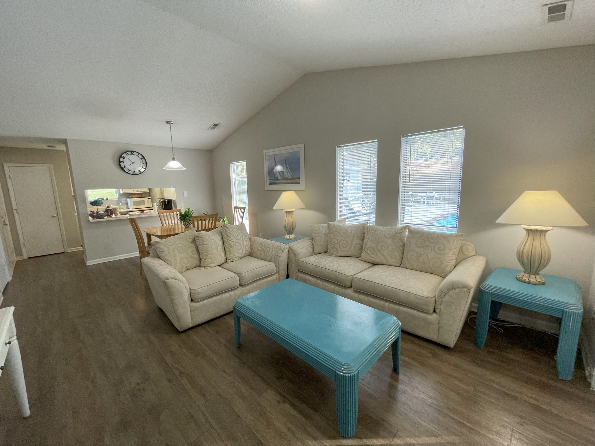 a living room with a couch and a table