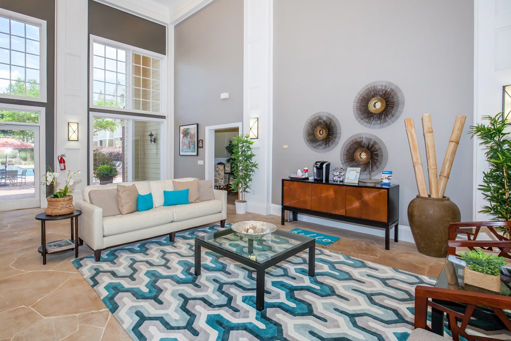 a living room with a couch and a coffee table