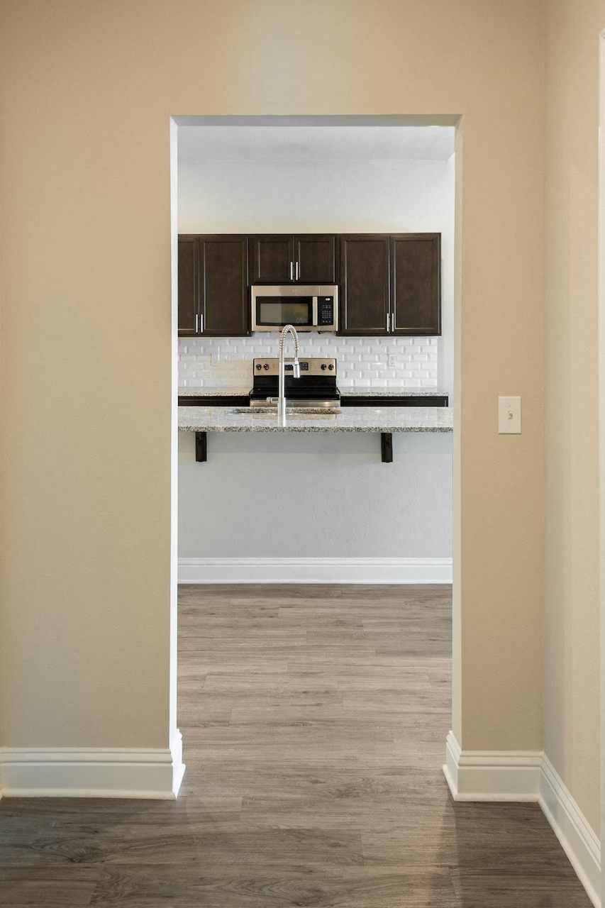 a view of the kitchen from the living room